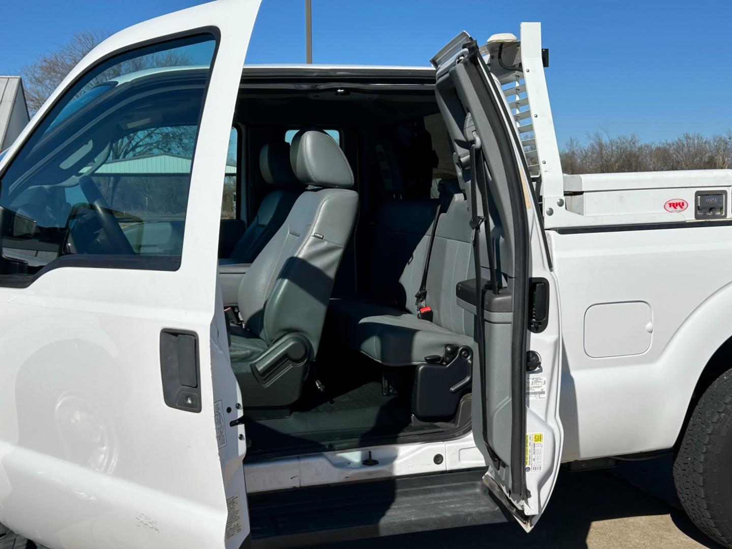 2015 White /Gray Ford F-250 SD (1FT7X2A62FE) with an 6.2L V8 OHV 16V engine, 6-Speed Automatic transmission, located at 17760 Hwy 62, Morris, OK, 74445, (918) 733-4887, 35.609104, -95.877060 - 2015 FORD F250 HAS THE 6.2 V8 ENGINE. THIS TRUCK IS BI-FUEL (RUNS ON BOTH CNG OR GASOLINE) FEATURES MANUAL SEATS, MANUAL LOCKS, MANUAL WINDOWS, MANUAL MIRRORS, AM/FM RADIO, CRUISE CONTROL, TRACTION CONTROL, BACK UP CAMERA. EQUIPPED WITH A WESTPORT BI-FUEL CNG FUEL SYSTEM. IT RUNS ON CNG (COMPRESSED - Photo#16